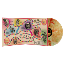 Load image into Gallery viewer, The Terraform The Afterlife - Candyland LP (Pre-order) is displayed beside a vibrant Toyland-themed board game, featuring illustrated monster faces, pastel paths, and playful cartoon decorations. A marbled yellow-orange Evil Island debut LP is also shown.
