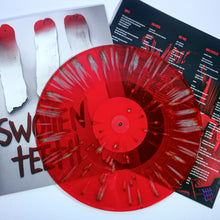 Load image into Gallery viewer, The Swollen Teeth - Swollen Teeth Blood Red Vinyl with Silver Splatter rests on an album cover featuring three painted teeth and bold Swollen Teeth text. A lyric sheet with red and white text is also included.
